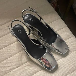 Brand new, never worn Zara heels in silver.